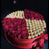 Round box with fresh cut roses! half roses and half Ferrero Roche