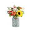 Like the splendor of a sunshine-filled day, our arrangement radiates happiness.This loose