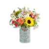 Like the splendor of a sunshine-filled day, our arrangement radiates happiness.This loose