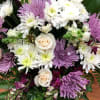 &quot;Like a heartfelt embrace, this beautiful casket spray delivers comfort and love