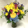 By Twin Towers Florist.  Send the spirit of the season to