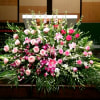 PODIUM ARRANGEMENT 106 BY TWIN TOWERS FLORIST

    As Shown