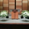 PODIUM ARRANGEMENT BY TWIN TOWERS FLORIST

    As Shown :
