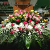 PODIUM ARRANGEMENT 97 BY TWIN TOWERS FLORIST

    As Shown