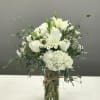 Blushing creams and Blushing blushes dance together in this homespun arrangement to