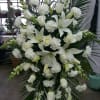 Pure white flowers of lilies, Snapdragons, roses and carnation provides a peaceful