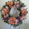 Let our wreath arrangement say your heartfelt condolences and sympathy.

This is 15&quot;