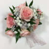 Delicate feminine design with lace ribbon.  Spray roses are the focus