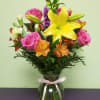 This fun and vibrant arrangement will fill anyone&#039;s day with color and