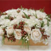A gorgeous mix of Imported White Roses and White Hydrangeas fill the