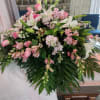 Wonderfully pink spray has pink roses, pink, mums, pink snapdragons, pink alstroemeria