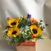 Mixed of sunflowers in a basket.