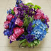 MONETS GARDEN CENTERPIECE BY TWIN TOWERS FLORIST Signature Classics Collection. Exclusive designs
