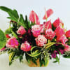 Tropical blooms designed with modern accents of roses, seasonal blooms (based on
