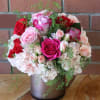 Modern cylinder vase with blush pink hydrangeas, pink, red, lavender, hot pink