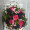 Hot Pink Spray Rose, Pink Limonium, Fern, and Black Ribbon with Hot