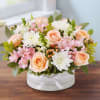 EXCLUSIVE An exquisite gift with garden-inspired style. Our blush-colored gathering of blooms