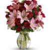 Lovely reds and pinks come together in this lavishly romantic anniversary gift.