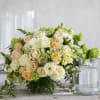 Velvety soft peach and butterscotch spray and garden roses create the perfect