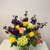 Beautiful mixed arrangement of Roses, Stock, Carnations, Green Hydrangeas and Alstromeria.