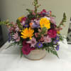 This artisan arrangement overall theme is bright bold colors.  The actual