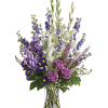 Lavender and white sympathy flowers make a grand statement in this joyful