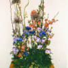 roses, asiatic lilies, and tulips with curly willow