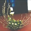 roses, asiatic lilies, and tulips with curly willow