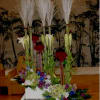roses, asiatic lilies, and tulips with curly willow