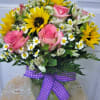 A bright and sunny day is what this arrangement conveys in it&#039;s