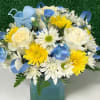 Beautiful arrangement in blue, white and yellow colors in pastel tones, to