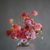 A piece of art work, dazzling shades of peaches, apricots, and lavender