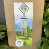 Double stained glass wind chimes with words of sympathy on the metal