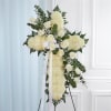 Honor a lifetime of faithful devotion with our beautiful standing cross arrangement.