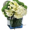 Impressionistic and impressive, this gorgeous arrangement of white and green blooms is