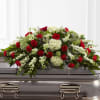 The Sincerity Casket Spray is a wondrous presentation of fresh color and