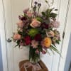 Beautiful rose arrangement, any colors that are available, with gorgeous composition touches