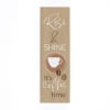 Cut from pine, this sign features a distressed background and artistic embellishments.