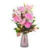 This combination of pink roses and assorted flowers with rose gold foliage