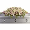 A beautiful spray of soft pink, white and cr&egrave;me blooms ease the