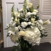 White fresh florals with generous texture and traditionally designed to create a