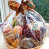 A gourmet assortment of fresh fruit with sweet and savory snacks perfect
