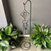 Double stained glass wind chimes with words of sympathy on the metal