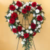 Send your Love and Sympathy with this beautiful standing heart of Red
