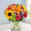 Like a warm embrace, our vibrant flower bouquet delivers your sentiments to