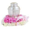 Pink, pretty and precious blooms provide a perfect bed for this memorial.
Approximately