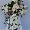 Beautiful flowers such as cr&egrave;me roses, white spray roses, carnation, leptospermum, cushion
