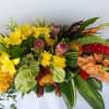 Mixed Tropical  Casket  Spray. 