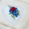 A satin heart pillow enhanced with a touch of flowers. Approximately 8&quot;W