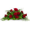 The Enduring Centerpiece features classic red roses and is designed beautifully to